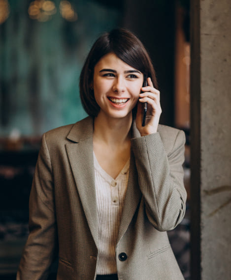 young business woman using phone cafe